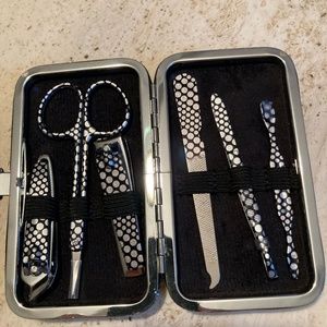 Manicure kit nail tools inside a glittery case